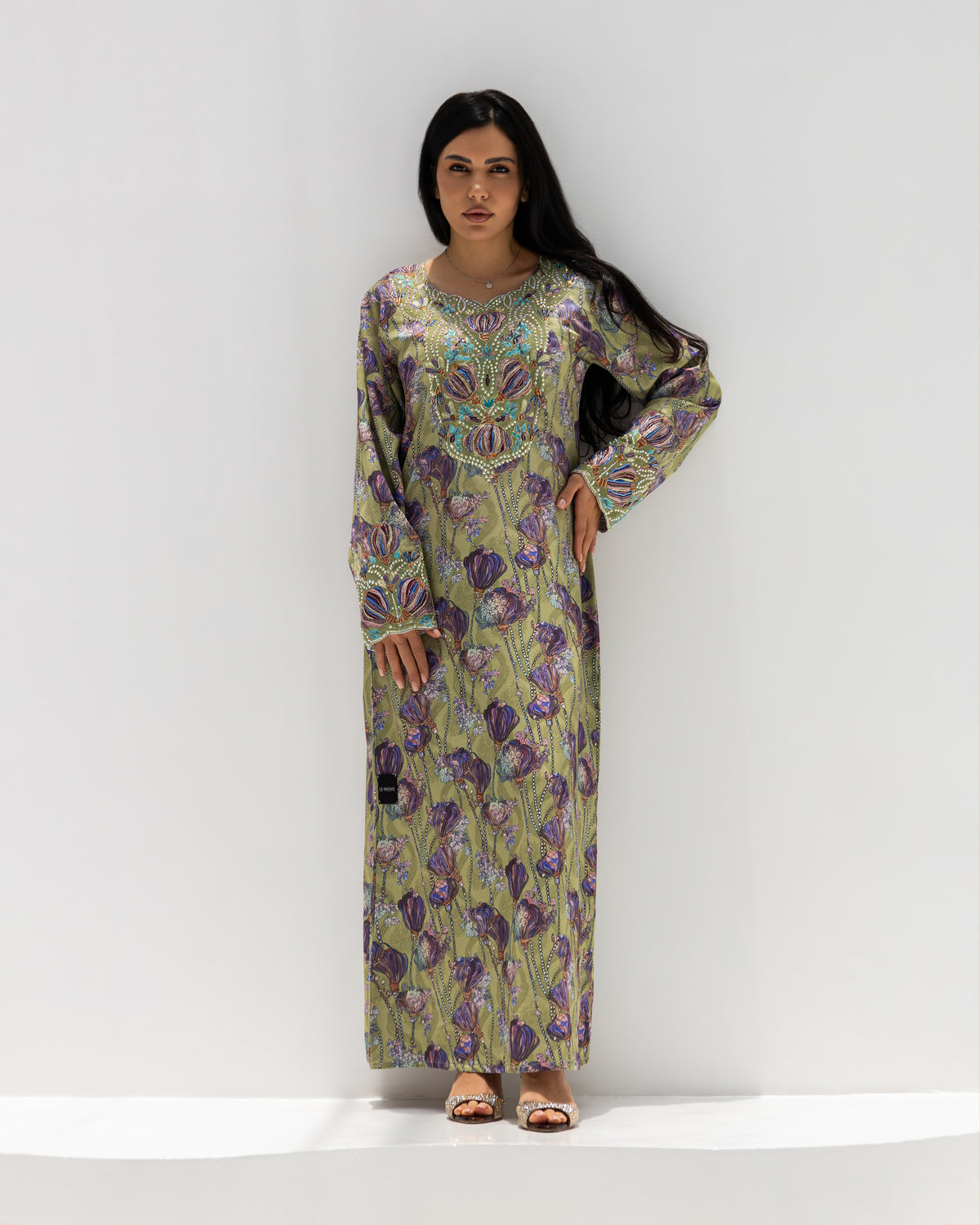 Sage Garden Mukhawar — traditional Emirati dress in jacquard silk with sage green floral embroidery