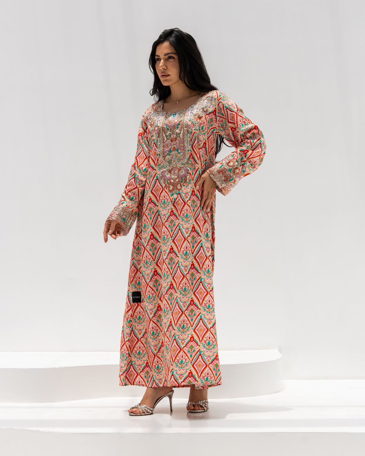 Coral Mosaic Mukhawar — traditional Emirati dress in cotton with mosaic embroidery at the neckline and cuffs