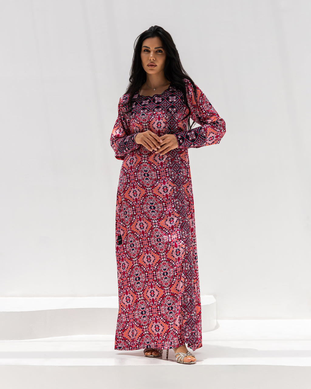 Kaleidoscope Mukhawar — traditional Emirati dress in Armani silk with multicoloured kaleidoscope embroidery