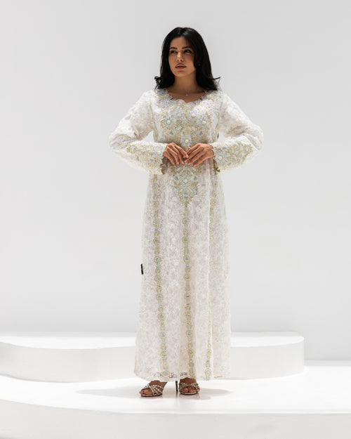 Ivory Lace Mukhawar — traditional Emirati dress in ivory lace threaded with gold, with hand embroidery