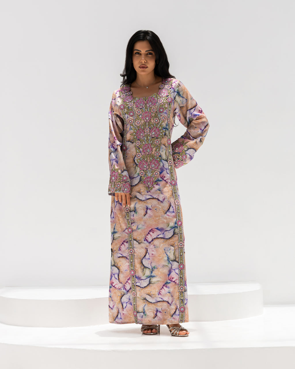 Marble Blossom Mukhawar — traditional Emirati dress in jacquard silk with floral embroidery on a marbled ground