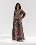 Midnight Rose Mukhawar — traditional Emirati dress in jacquard silk with rose embroidery on a dark ground