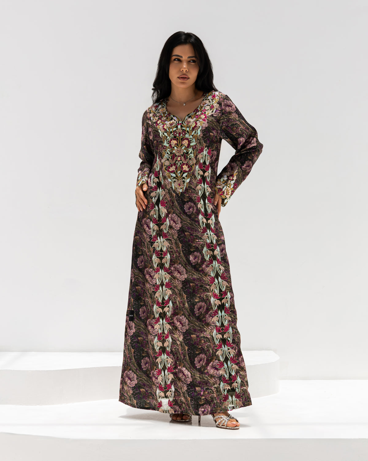 Midnight Rose Mukhawar — traditional Emirati dress in jacquard silk with rose embroidery on a dark ground