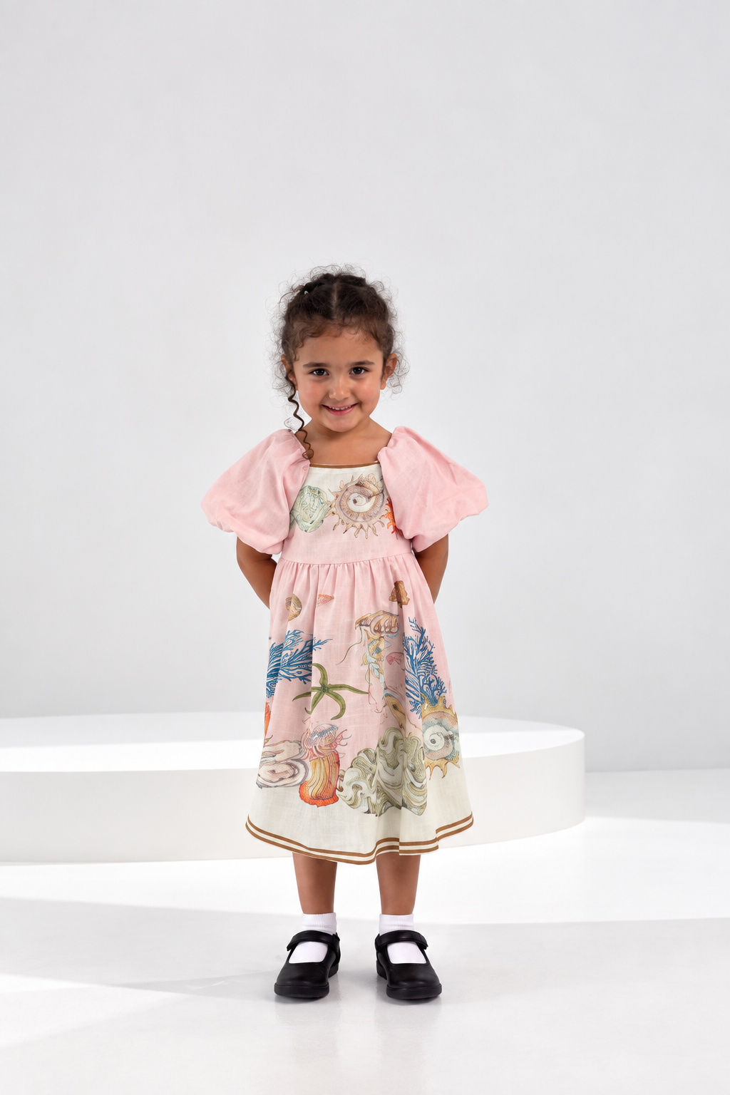 Pink seashell print girls dress in linen blend with puff sleeves