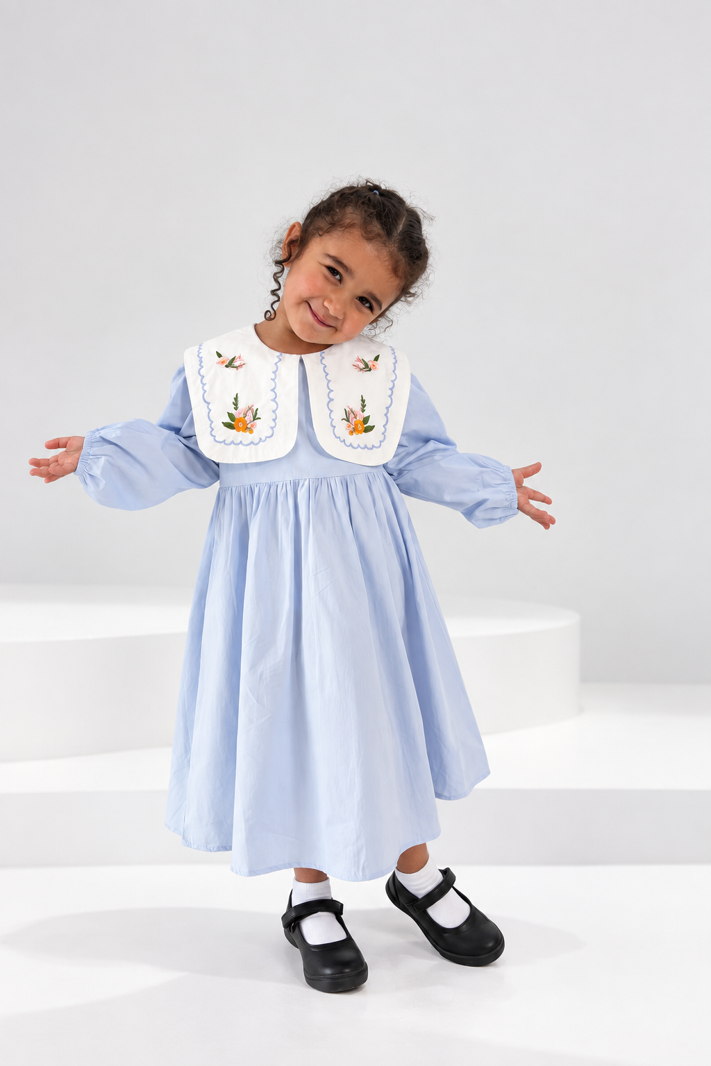 Powder blue cotton girls dress with an embroidered floral collar